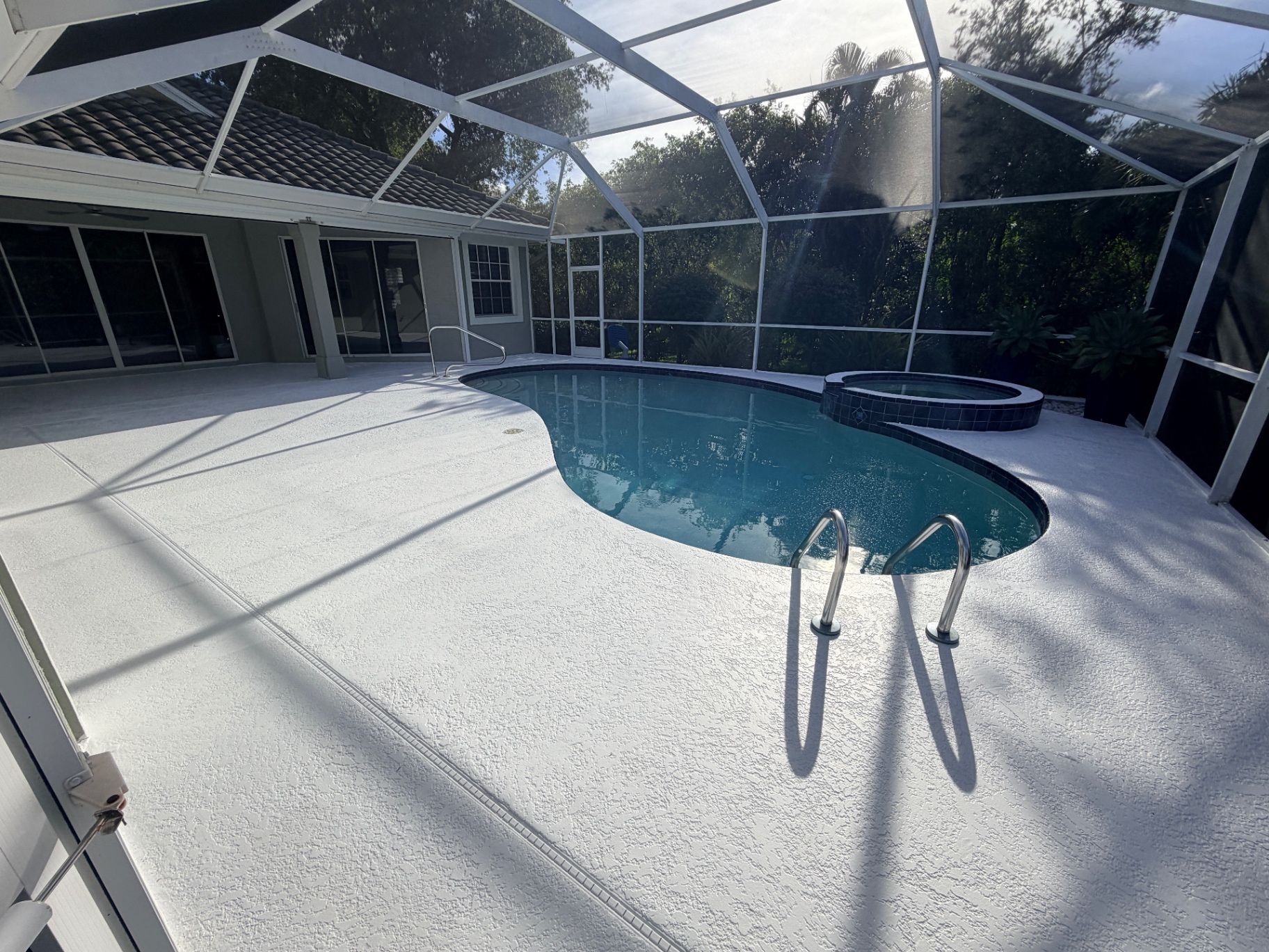 Pool deck coating with spa