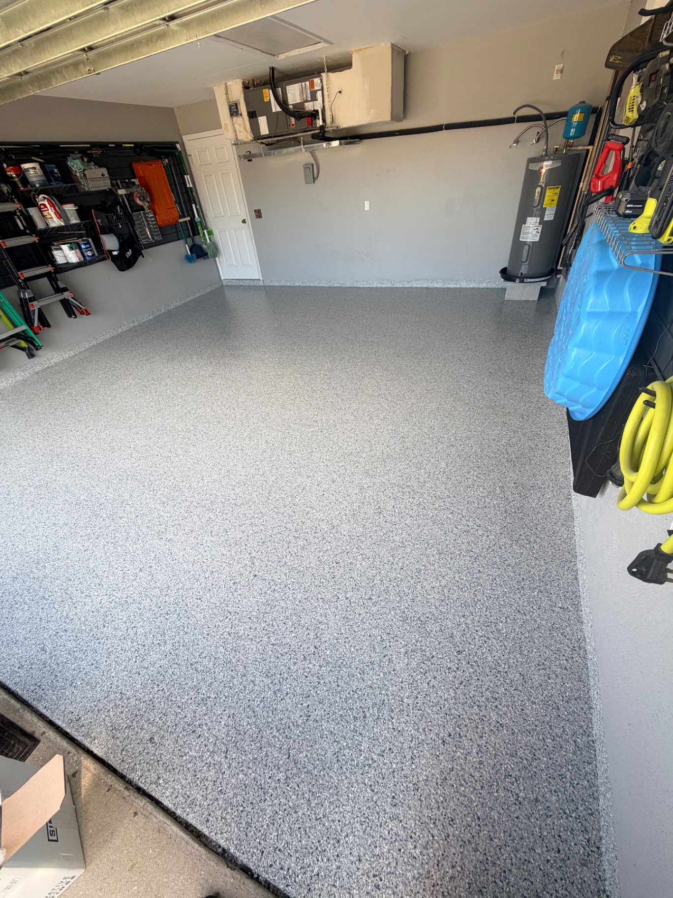 Completed garage floor with flake epoxy coating