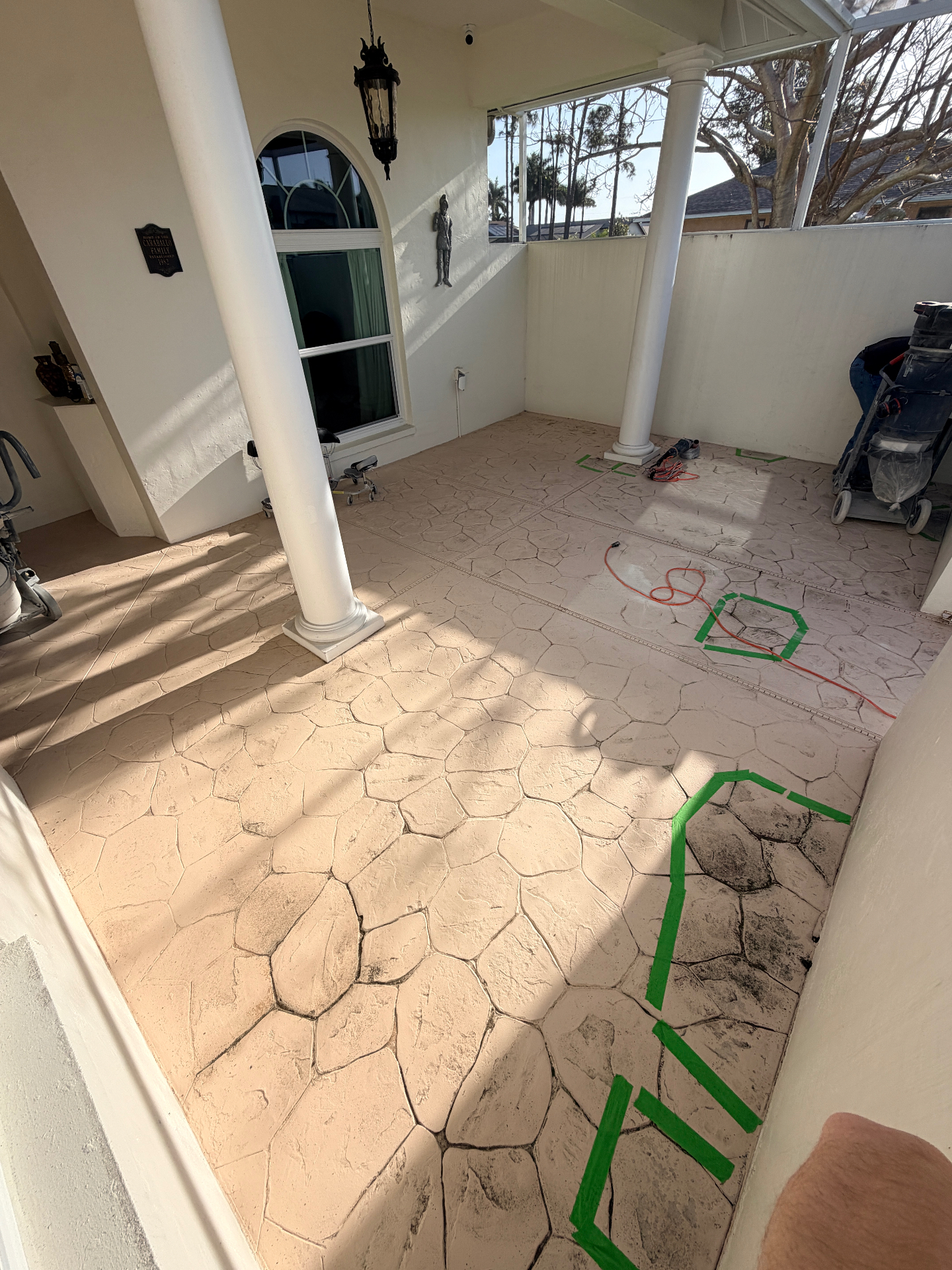 Front porch surface prep with taped repair areas