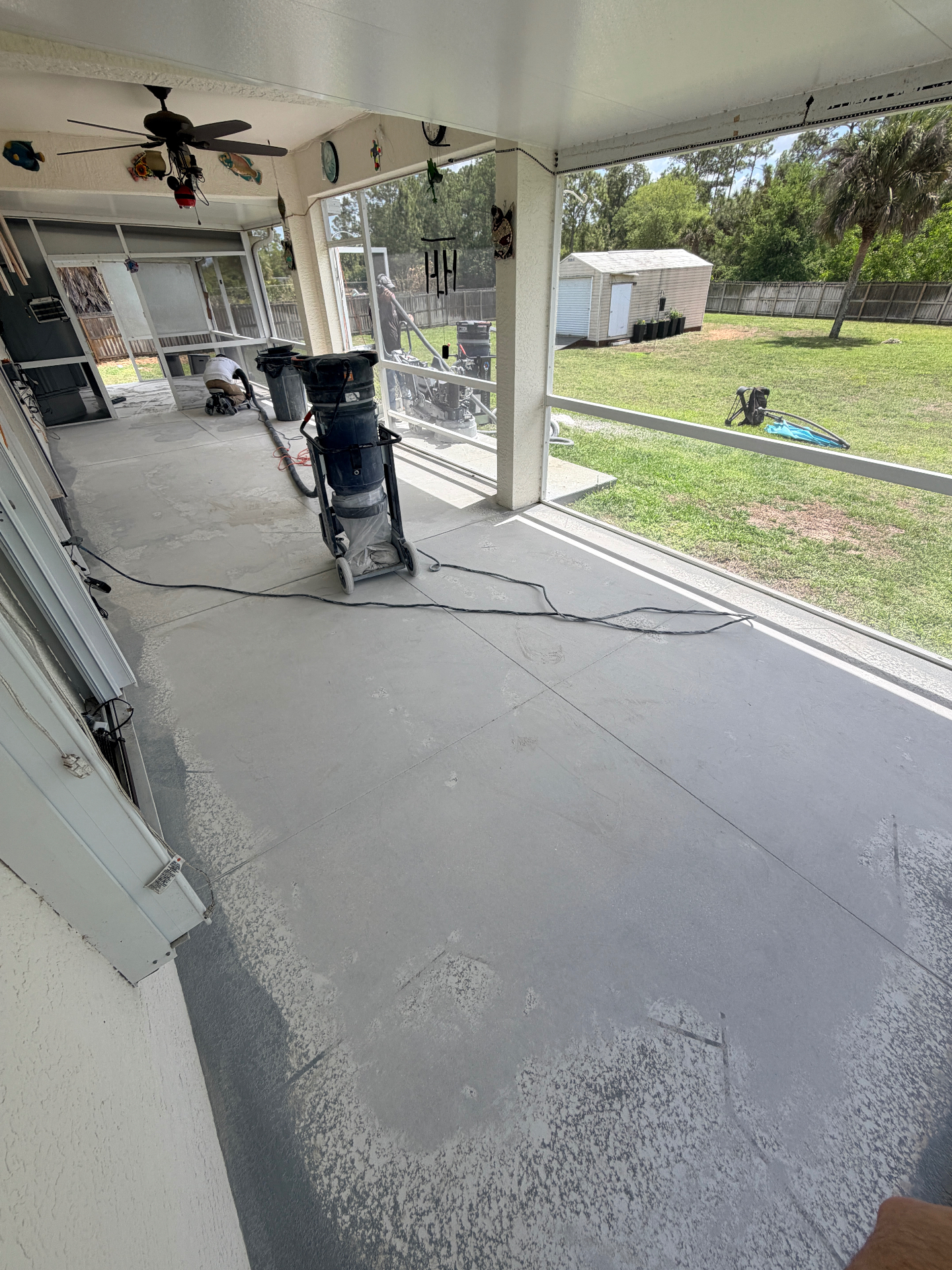 Screened lanai floor in gray flake coating